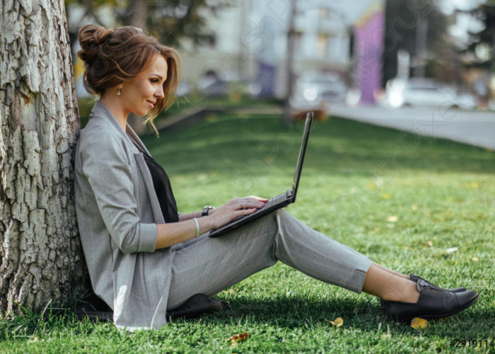 young-happy-business-woman-with-2919114